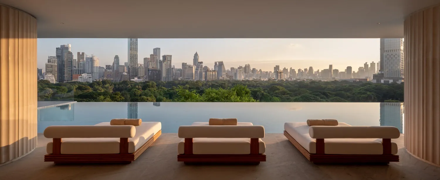 Infinity pool at Dusit Thani Bangkok overlooking Lumpini Park and the city skyline. Photo: Dusit International