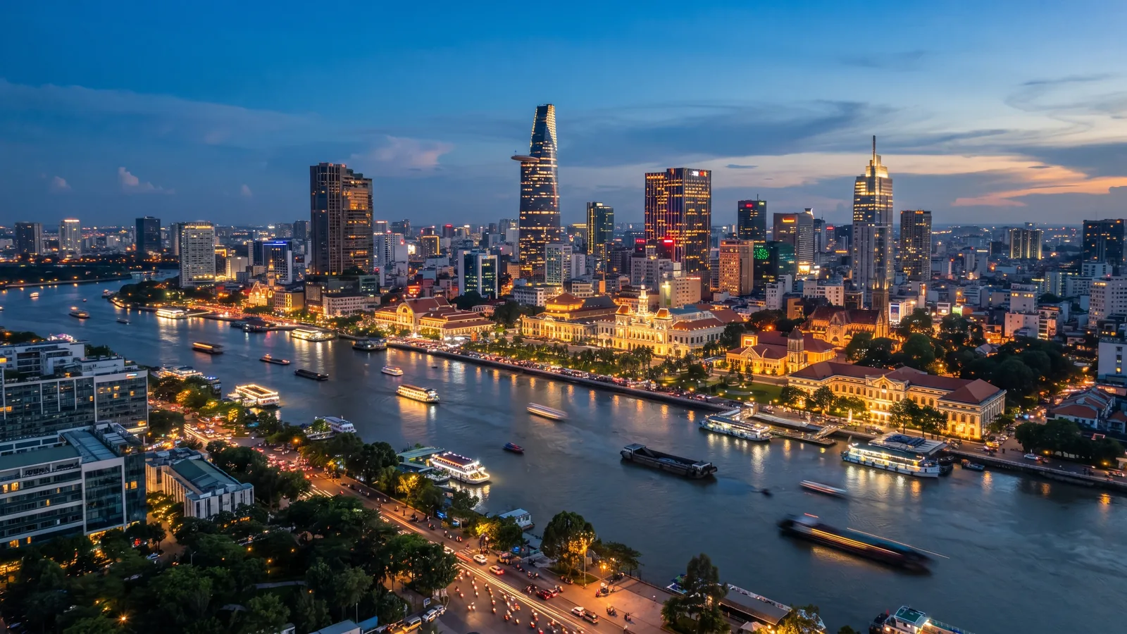District 1 hotel towers along the Saigon River at blue hour, Ho Chi Minh City