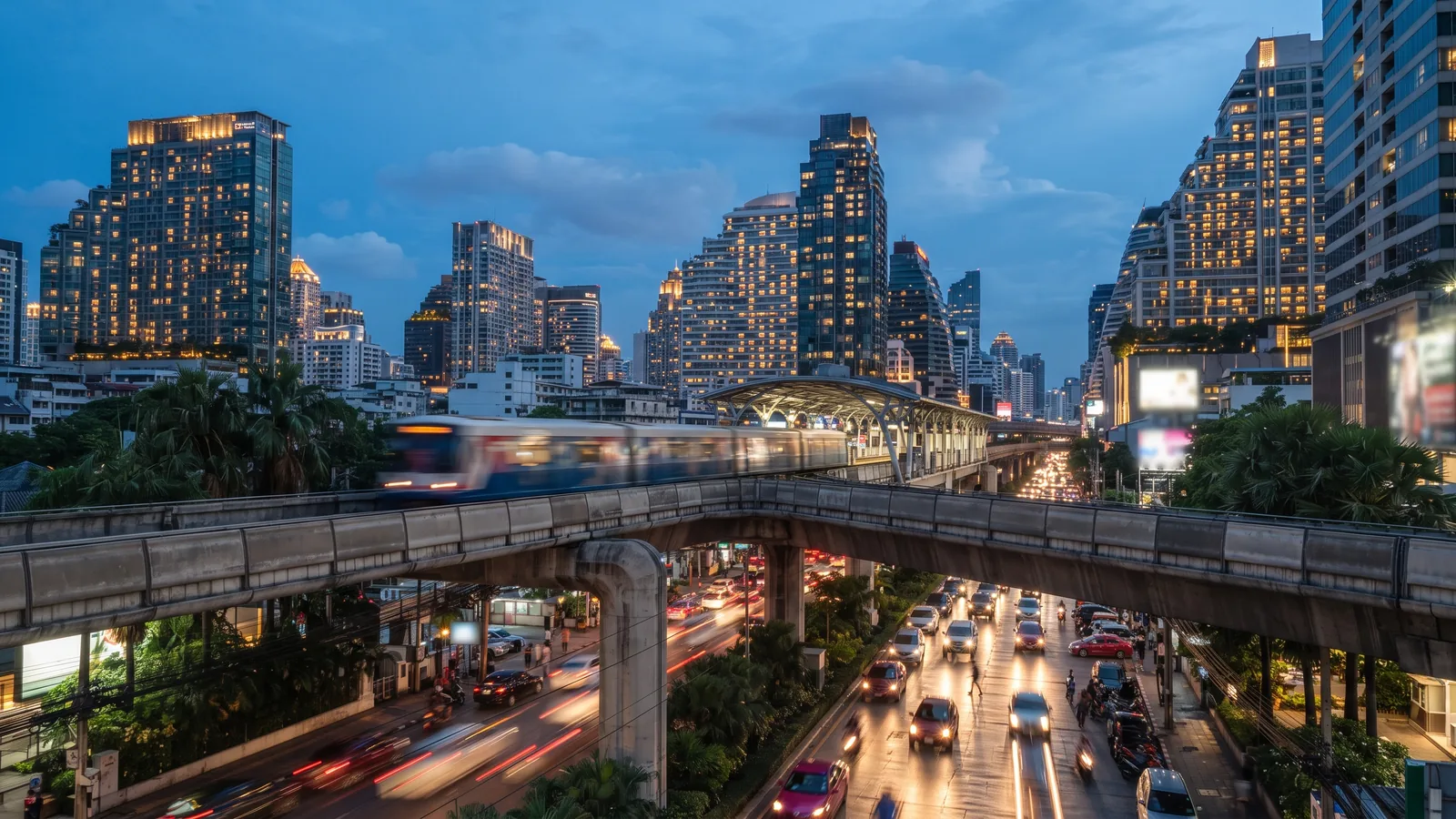 Bangkok Sukhumvit skyline with elevated rail at blue hour